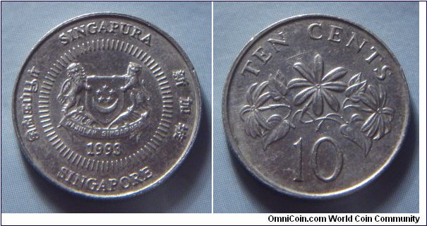 Singapore | 
10 Cent, 1993 | 
18.5 mm, 2.6 gr. | 
Copper-nickel | 

Obverse: National Coat of Arms with ribbons downwards, date below | 
Lettering: சிங்கப்பூர் SINGAPURA 新加坡 SINGAPORE 1993 | 

Reverse: The Star Jasmine, denomination below | 
Lettering: TEN CENTS 10 |