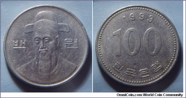 South Korea | 
100 Won, 1993 | 
24 mm, 5.42 gr. | 
Copper-nickel | 

Obverse: Admiral Yu Sun-Sin (1545-1598) divides denomination | 
Lettering: 백 원 | 

Reverse: Denomination, date above | 
Lettering: 1993 100 한국은행 |
