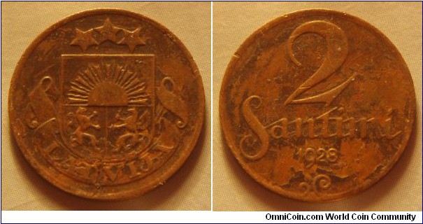 Latvia | 
2 Santīmi, 1928 | 
19.5 mm, 2 gr. | 
Bronze | 

Obverse: National Coat of Arms | 
Lettering: LATVIJA | 

Reverse: Denomination, date below | 
Lettering: 2 Santimi 1928 |