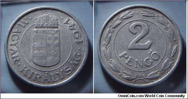 Kingdom of Hungary | 
2 Pengő, 1941 | 
28 mm, 2.8 gr. | 
Aluminium | 

Obverse: National Coat of Arms, date right | 
Lettering: • MAGYAR • KIRÁLYSÁG • 1941 • | 

Reverse: Denomination | 
Lettering: 2 PENGŐ |