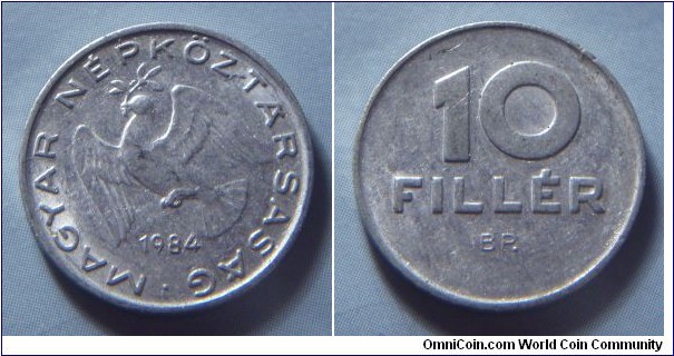 Hungarian People's Republic | 
10 Fillér, 1984 | 
18.5 mm, 0.6 gr. | 
Aluminium | 

Obverse: Dove flying with sprig in beak, date below | 
Lettering: • MAGYAR NÉPKÖZTÁRSASÁG 1984 | 

Reverse: Denomination | 
Lettering: 10 FILLÉR |