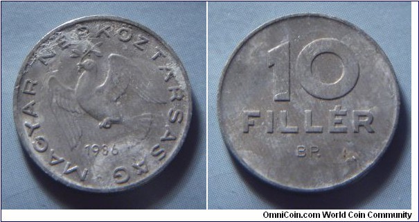 Hungarian People's Republic | 
10 Fillér, 1986 | 
18.5 mm, 0.6 gr. | 
Aluminium | 

Obverse: Dove flying with sprig in beak, date below | 
Lettering: • MAGYAR NÉPKÖZTÁRSASÁG 1986 | 

Reverse: Denomination | 
Lettering: 10 FILLÉR |