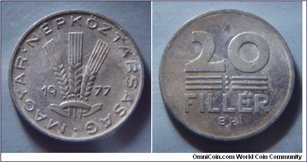 Hungarian People's Republic | 
20 Fillér, 1977 | 
20.3 mm, 0.95 gr. | 
Aluminium | 

Obverse: Three wheat stalks divides date | 
Lettering: • MAGYAR • NÉPKÖZTÁRSASÁG 1977 | 

Reverse: Denomination | 
Lettering: 20 FILLÉR |