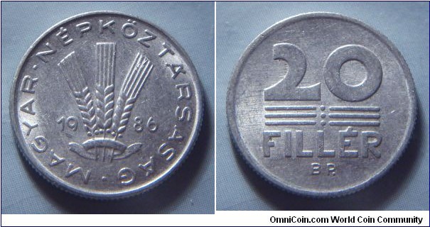 Hungarian People's Republic | 
20 Fillér, 1986 | 
20.3 mm, 0.95 gr. | 
Aluminium | 

Obverse: Three wheat stalks divides date | 
Lettering: • MAGYAR • NÉPKÖZTÁRSASÁG 1986 | 

Reverse: Denomination | 
Lettering: 20 FILLÉR |