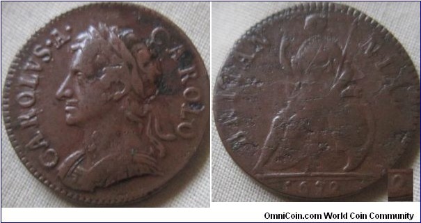 1672 farthing, VF with planchet flaws, and struck with a worn die.. the loop on the 2 is joined to the bottom of the 2 also.