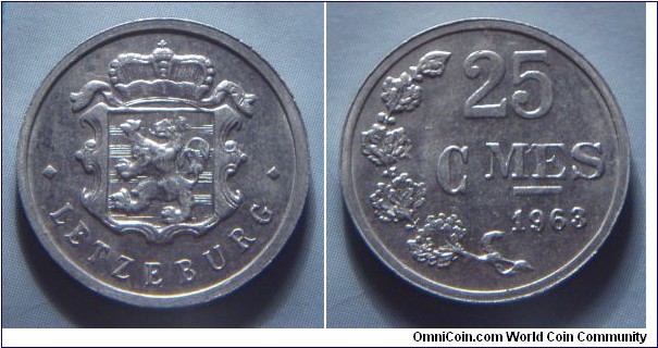 Luxembourg | 
25 Centimes, 1963 | 
19 mm, 0.76 gr. | 
Aluminium | 

Obverse: National Coat of Arms | 
Lettering: • LETZEBURG • |

Reverse: Denomination, date below | 
Lettering: 25 CMES 1963 |