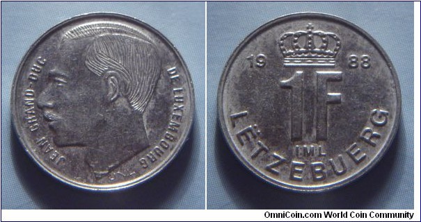 Luxembourg | 
1 Franc, 1988 | 
18 mm, 2.75 gr. | 
Nickel plates Steel | 

Obverse: Adolphe, Grand Duke of Luxembourg facing left | 
Lettering: JEAN GRAND-DUC DE LUXEMBOURG |

Reverse: Date divided by crown, denomination below | 
Lettering: 1988 1F LËTZEBUERG |