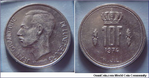 Luxembourg | 
10 Francs, 1974 | 
27 mm, 8 gr. | 
Nickel | 

Obverse: Jean, Grand Duke of Luxembourg facing left | 
Lettering: JEAN GRANDE-DUC DE LUXEMBOURG |

Reverse: Crown divides date, denmoniation below | 
Lettering: 10F 1974 |