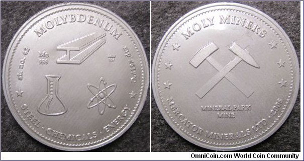 42Mo Molybdenum medal struck from blank cut from the end of a molybdenum rod. (JM11)