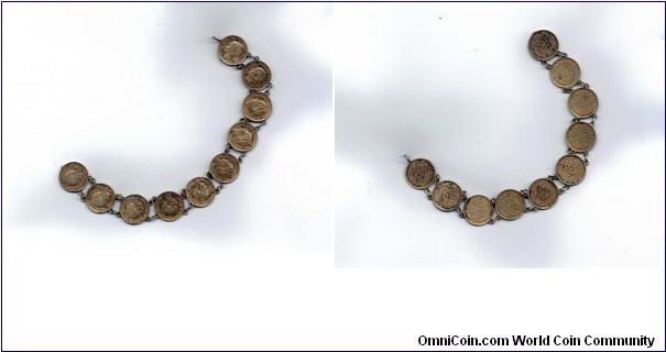 Netherlands 10 cent 1944 D coins in a bracelet (more info http://www.catawiki.co.uk/catalog/coins/countries/the-netherlands/161725-netherlands-10-cent-1944-d )