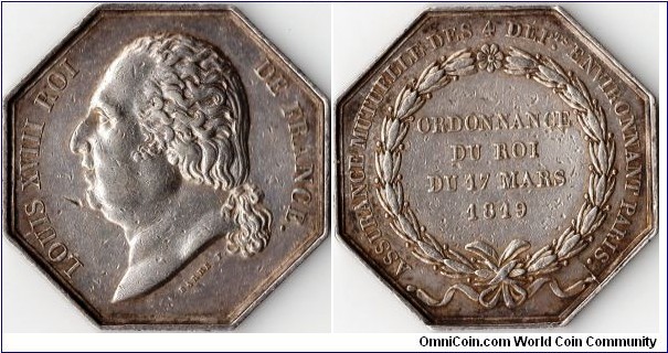 Silver jeton (variant) struck for the `Mutuelle des 4 Departements Environnant Paris' in 1819 during the second reign of LOuis XVIII. The company covered fire risks. This example has a smaller bust and signature from the main variety.