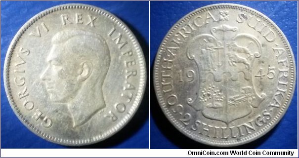 1945 2 shilling George VI with coat of armour. Rare find. Very Good.