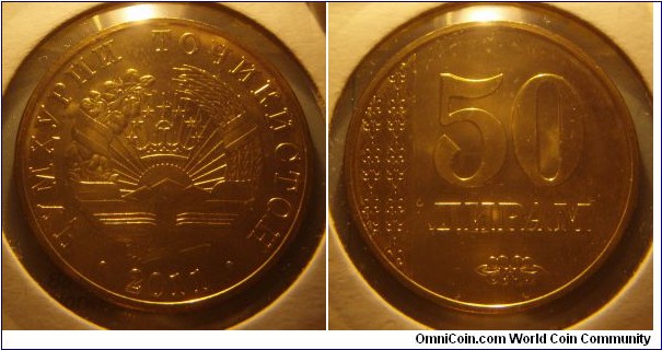 Tajikistan | 
50 Diram, 2011 | 
26 mm, 5.5 gr. | 
Brass plated Steel | 

Obverse: National Coat of Arms, date below | 
Lettering: • ҶУМҲУРИИ ТОҶИКИСТОН • 2011 | 

Reverse: Ornament, denomination right | 
Lettering: 50 ДИРАМ |