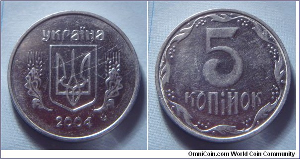 Ukraine | 
5 Kopiyok, 2004 | 
24 mm, 4.3 gr. | 
Stainless Steel | 

Obverse: National Coat of Arms, date below | 
Lettering: україна 2004 |

Reverse: Denomination | 
Lettering: 5 копійок |