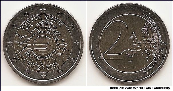 2 Euro
KM#97
8.5000 g., Bi-Metallic Nickel-Brass center in Copper-Nickel ring, 25.75 mm. Subject : Euro Coinage, 10th Anniversary Obv: The inner part of the coin features the world in the form of a euro symbol in the centre, showing how the euro has become a true global player over the last ten years. The surrounding elements symbolise the importance of the euro to ordinary people (represented by a family group and houses), to the financial world (the Eurotower), to trade (a ship), to industry (a factory), and to the energy sector and research and development (two wind turbines). The designer’s initials, “A.H.”, can be found between the ship and the Eurotower. Along the upper and lower edges of the inner part of the coin are, respectively, the country of issue ΚΥΠΡΟΣ KIBRIS and the years “2002 – 2012”. The twelve stars of the European Union surround the design on the outer ring of the coin. Rev: 2 on the left-hand side, six straight lines run vertically between the lower and upper right-hand side of the face, 12 stars are superimposed on these lines, one just before the two ends of each line, superimposed on the mid - and upper section of these lines; the European continent ( extended ) is represented on the right-hand side of the face; the right-hand part of the representation is superimposed on the mid-section of the lines; the word ‘EURO’ is superimposed horizontally across the middle of the right-hand side of the face. Under the ‘O’ of EURO, the initials ‘LL’ of the engraver appear near the right-hand edge of the coin. Edge: Reeded with 2 EYPΩ 2 EURO 2 EYPΩ 2 EURO. Obv. designer: Helmut Andexlinger Rev. designer: Luc Luycx