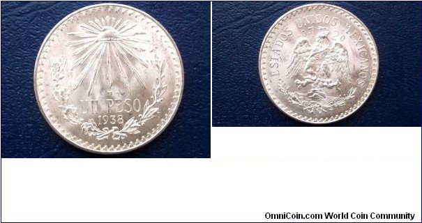 .720 Silver 1938 Mexico Peso KM#455 Cap & Rays Type Nice Gem BU Coin Go Here:

http://stores.ebay.com/Mt-Hood-Coins