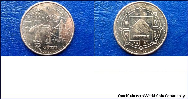 2063-2006 Nepal 2 Rupee Coin:

Shah Dynasty
Large 25mm Coin
Mt Everest & Water Buffalo Go Here:

http://stores.ebay.com/Mt-Hood-Coins
