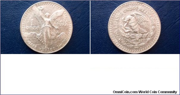 Sold !! Silver 1988 Mexico Onza 1 Troy Oz KM# 494.1 Winged Victory Nice Grade 
Go Here:

http://stores.ebay.com/Mt-Hood-Coins