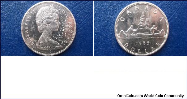 ilver 1965 Canada Dollar KM#64.1 Voyageur Canoe Toned UNC Coin 
Go Here:

http://stores.ebay.com/Mt-Hood-Coins