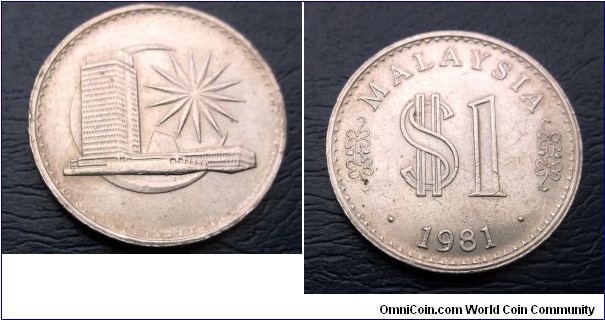1981 Malaysia Ringgit KM# 9.1 Parliment House Large 33.4mm Crown Nice Grade Go Here:

http://stores.ebay.com/Mt-Hood-Coins