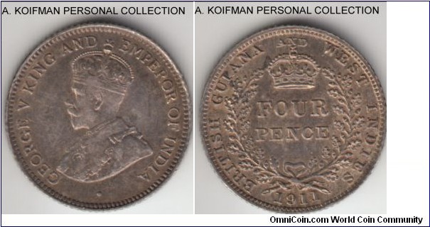 KM-28, 1911 British Guiana 4 pence; silver, reeded edge; very fine (obverse) to extra fine (reverse) with very nice reverse toning, scarce with mintage of 30,000.
