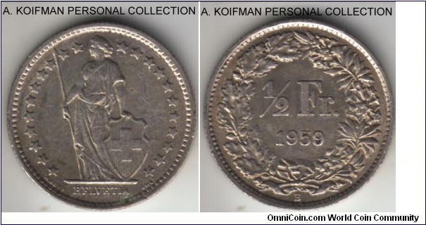 KM-23, 1959 Switzerland 1/2 franc; silver, reeded edge; good extra fine.