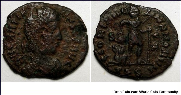 Gratian, AE3 of Thessalonica, 367-375 AD. DN GRATIANVS PF AVG, pearl diademed, draped, cuirassed bust right / GLORIA ROMANORUM, Gratian walking right, holding labarum and dragging captive. S in left field, star over A in right field. Mintmark TES