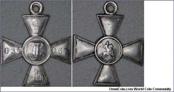 Silver st.George s cross no.1034067 awarded to romanian soldierN.C.Vasile at 07/08/1917.Weight  11,19gr. 