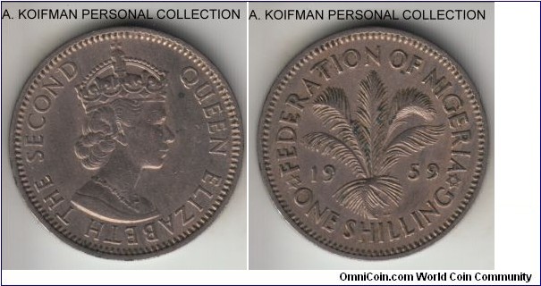 KM-5, 1959 Federation of Nigeria shilling; copper-nickel, security edge; short lived predecimal coinage preceding independence and establishment of the republic, decent very fine to about extra fine or so.