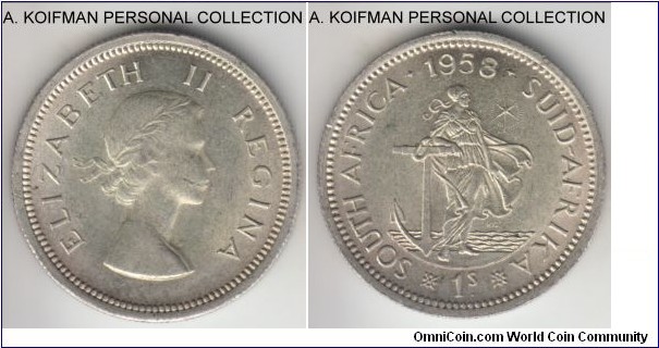 KM-49, 1958 South Africa (Dominion) shilling; silver, reeded edge; extra fine or so with some scuffing on Queen's effigy.