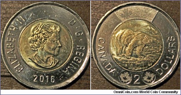 2 dollars. this version of the coin started in 2012. Bi-metallic, 28mm.