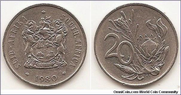 20 Cents
KM#86
6.00 g., Nickel, 24.2 mm. Obv: Arms with supporters, bilingual legend SUID-AFRIKA and SOUTH AFRICA Rev: A Royal Protea, South Africa's national flower, value at left Edge: Plain 