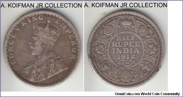 KM-522, 1912 British India 1/2 rupee, Bombay mint (dot under flower); silver, reeded edge; George V, early years with the smaller mintages, good fine to very fine, small scratch on obverse.