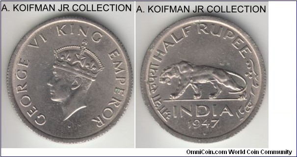KM-553, 1947 British India 1/2 rupee, Bombay mint (diamond under date); nickel, reeded edge; George VI immediately pre-independence, almost uncirculated.