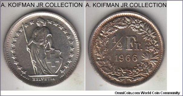 KM-23, 1966 Switzerland 1/2 franc; silver, reeded edge; average uncirculated with lightly toned reverse.