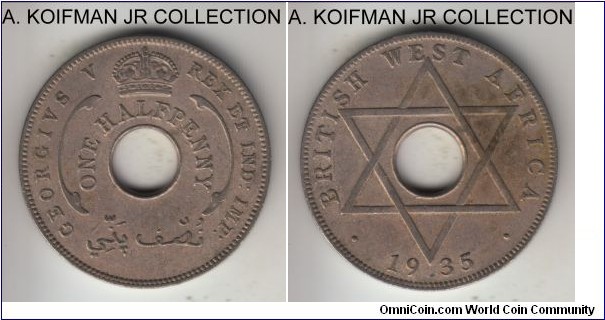 KM-8, 1935 British West Africa 1/2 penny; copper nickel, holed flan, plain edge; George V, good very fine details, old cleaning.