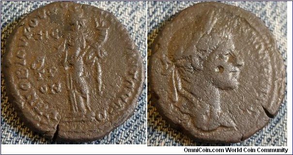 218-222Ad Elagabalus Ae 26 of Nicopolis ad Istrum Moesia Inferior. Homonoia standing L holding patera and cornucopiae. Laureate head