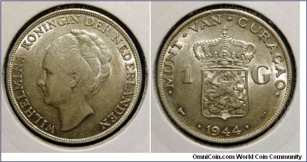 Curacao 1 gulden.
1944, Queen Wilhelmina. Ag 720. Weight; 10g. Mintage: 500.000 pcs.