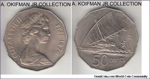 KM-36, 1976 Fiji 50 cents; copper-nickel, 12-sided flan, plain edge; Elizabeth II, 2'nd portrait, uncirculated, few edge bumps and what looks like a strike through or a thin cut on obverse.