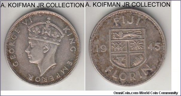 KM-13, 1945 Fiji florin; silver, reeded edge; George VI, 3-year type with all years in small mintage and 1945 particularly scarce despite 100,000 minted, good very fine details, old cleaning and a tiny rim nick.