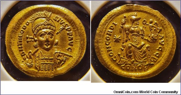 Eastern Roman Empire, Theodosius II | 
Solidus, 402-450 | 
22 mm, 4.49 gr | 
Gold | 

Obverse: Bust of Theodosius facing, helmeted, cuirassed, holding spear with right hand over right shoulder and on left shoulder a shield decorated with a horseman riding down enemy | 
Lettering: D N THEODOSIVS P F AVG | 

Reverse: Constantinopolis helmeted, enthroned facing, head right, holding scepter with right hand and with left hand turned upwards a small winged Victory on globe | 
Lettering: CONCORDIA AVGG I CONOB | 