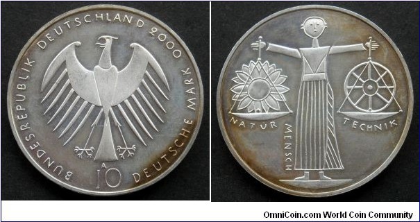 Germany 10 mark.
2000 A, Expo 2000.
Ag 925. Weight; 15,5g. Diameter; 32,5mm. Mintage: 3.000.000 pcs.
