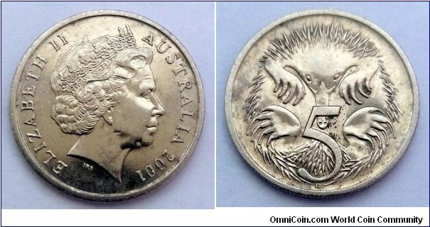 Australia 5 cents.
2001