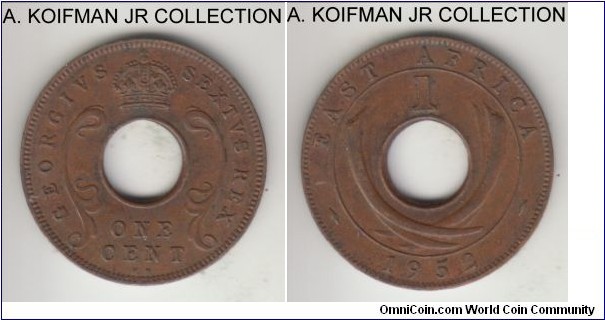 KM-32, 1952 East Africa cent, Kings Norton mint (KN mint mark); bronze, holed flan, plain edge; George VI, good extra fine to almost uncirculated and toned.