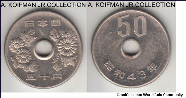 Y#81, Showa Yr. 43 (1968) Japan 50 yen; copper-nickel, holed flan, reeded edge; average uncirculated.