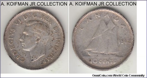 KM-34, 1947 Canada 10 cents; silver, reeded edge; George VI, last of the first type, before IMP. IND. was removed, maple leaf by the date variety, about very fine.