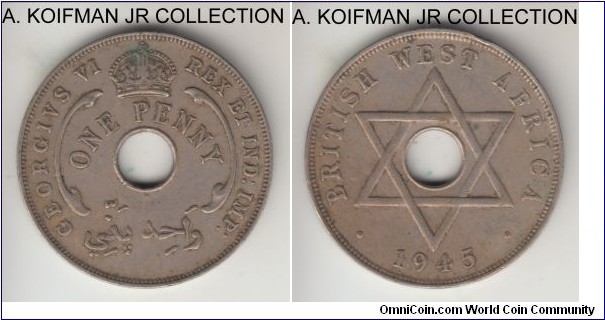 KM-19, 1945 British West Africa penny, Heaton mint (H mint mark); copper-nickel, holed flan, plain edge; George VI, less common year, good very fine.