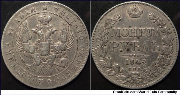 AR 1 Rouble 1842 SPB-ACH. 1841 style eagle with 9 feathers in the tail. 8 segment wreath on the reverse.
