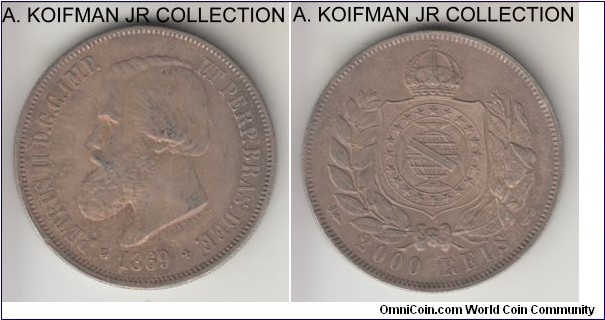 KM-475, 1869 Brazil (Empire) 2000 reis; silver, reeded edge; Pedro II, 2- year type, toned about uncirculated.