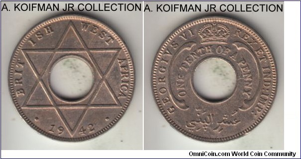 KM-20, 1942 British West Africa 1/10 penny, Royal Mint (no mint mark); copper nickel, holed flan, plain edge; George VI, another common year, uncirculated details, but excessive bag marks.